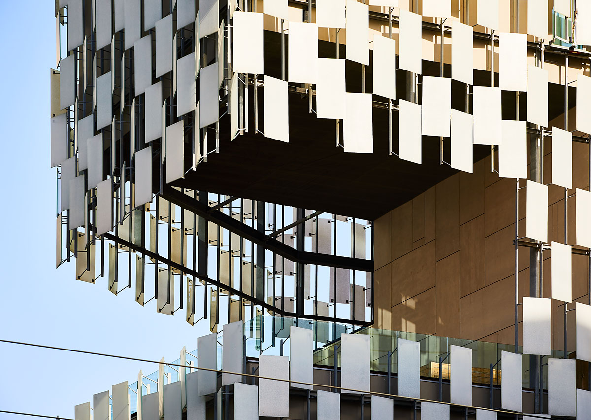 The enamelled glass facade of Frac Sud, designed by Kengo Kuma